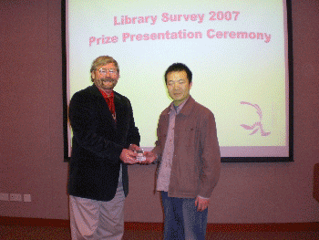 The University Librarian, Dr. Colin Storey, presented prizes to the prize draw winners on Jan 17, 2008.